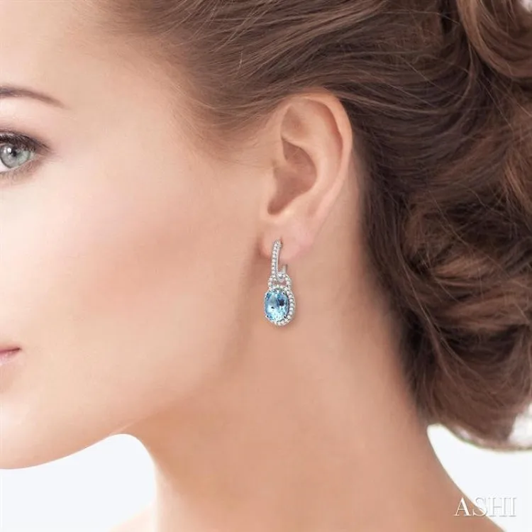 9x7 MM Oval Cut Aquamarine and 3/8 ctw Round Cut Diamond Earrings in 14K White Gold