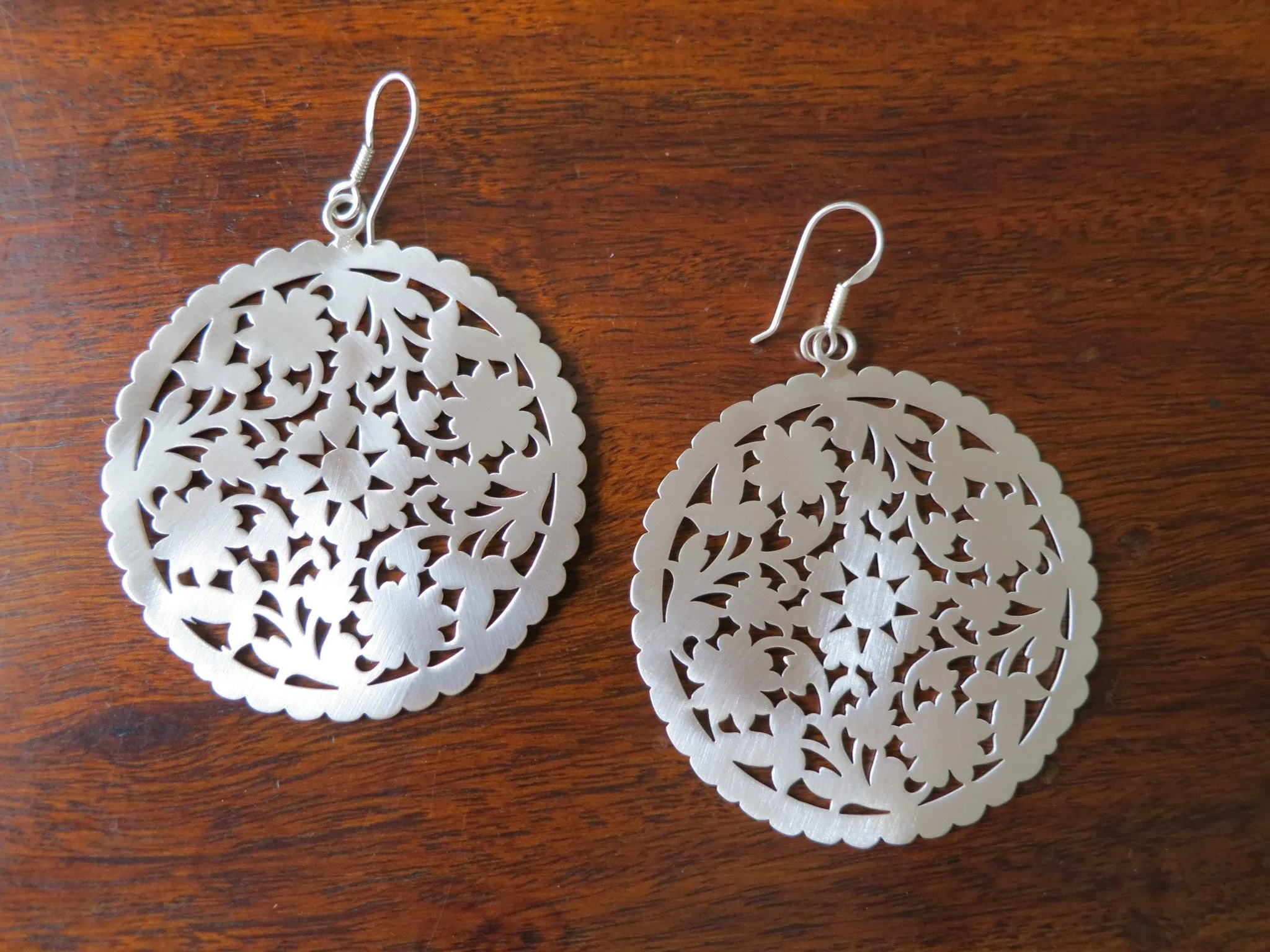 Dramatic, Marrakesh inspired, big round floral pattern cut-out earrings in satin finish