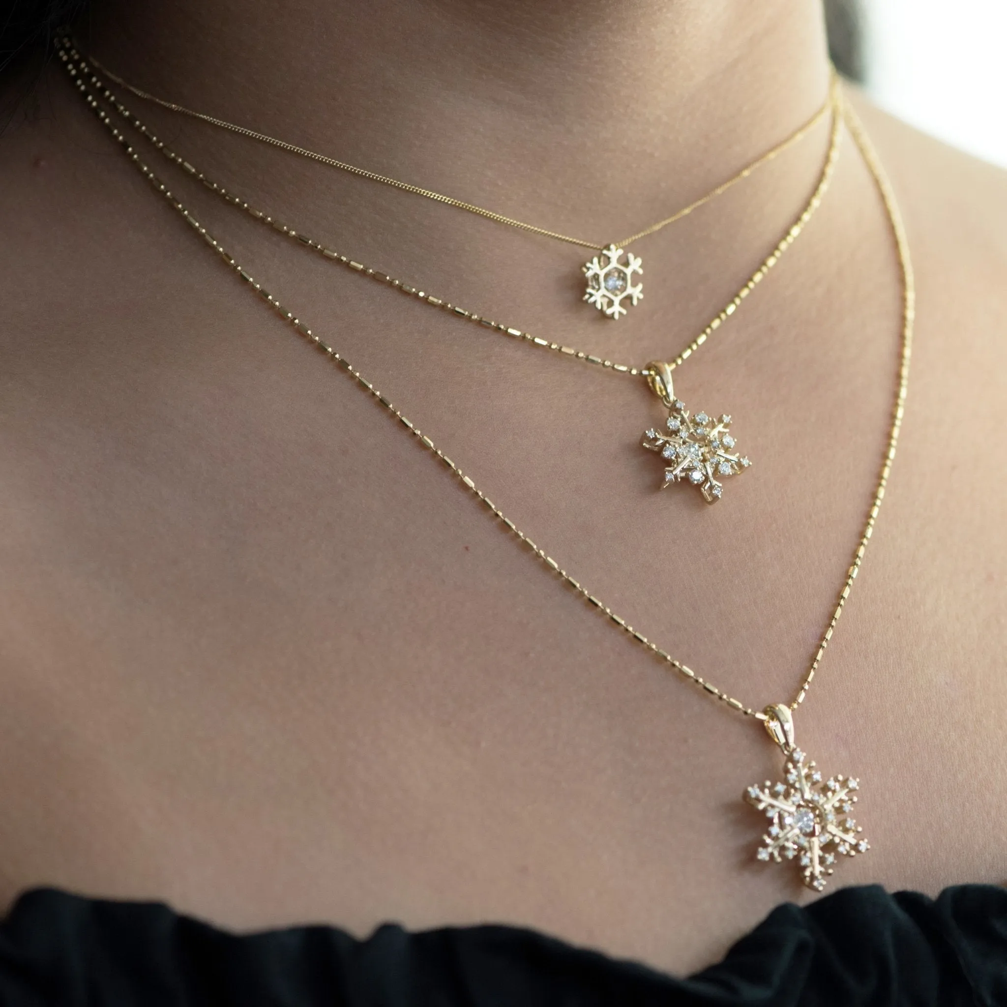 Gold Dancing Diamond Snowflake Necklace