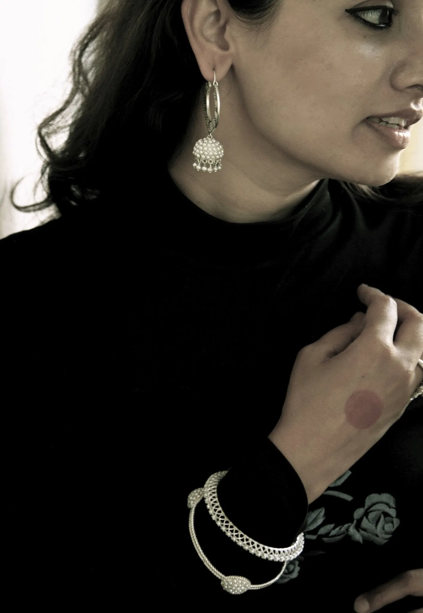 Large, chevron cut-out pattern chandelier earrings with 'jhumkis'