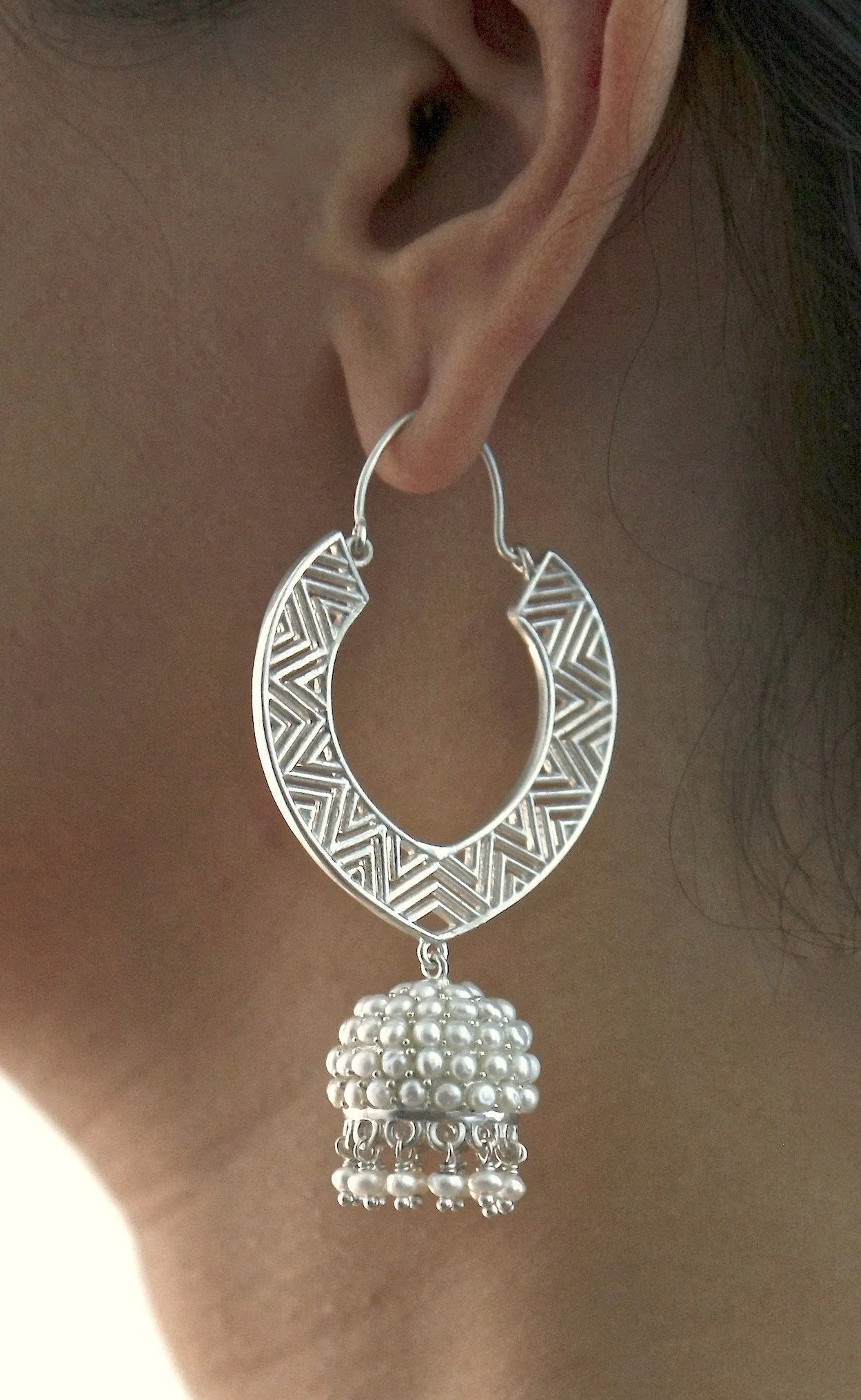 Large, chevron cut-out pattern chandelier earrings with 'jhumkis'
