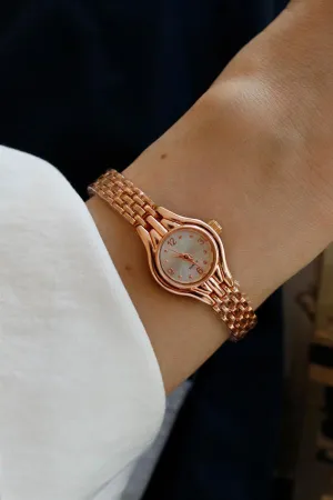 <tc>Bella Rose Montre pour femme en métal.

</tc>