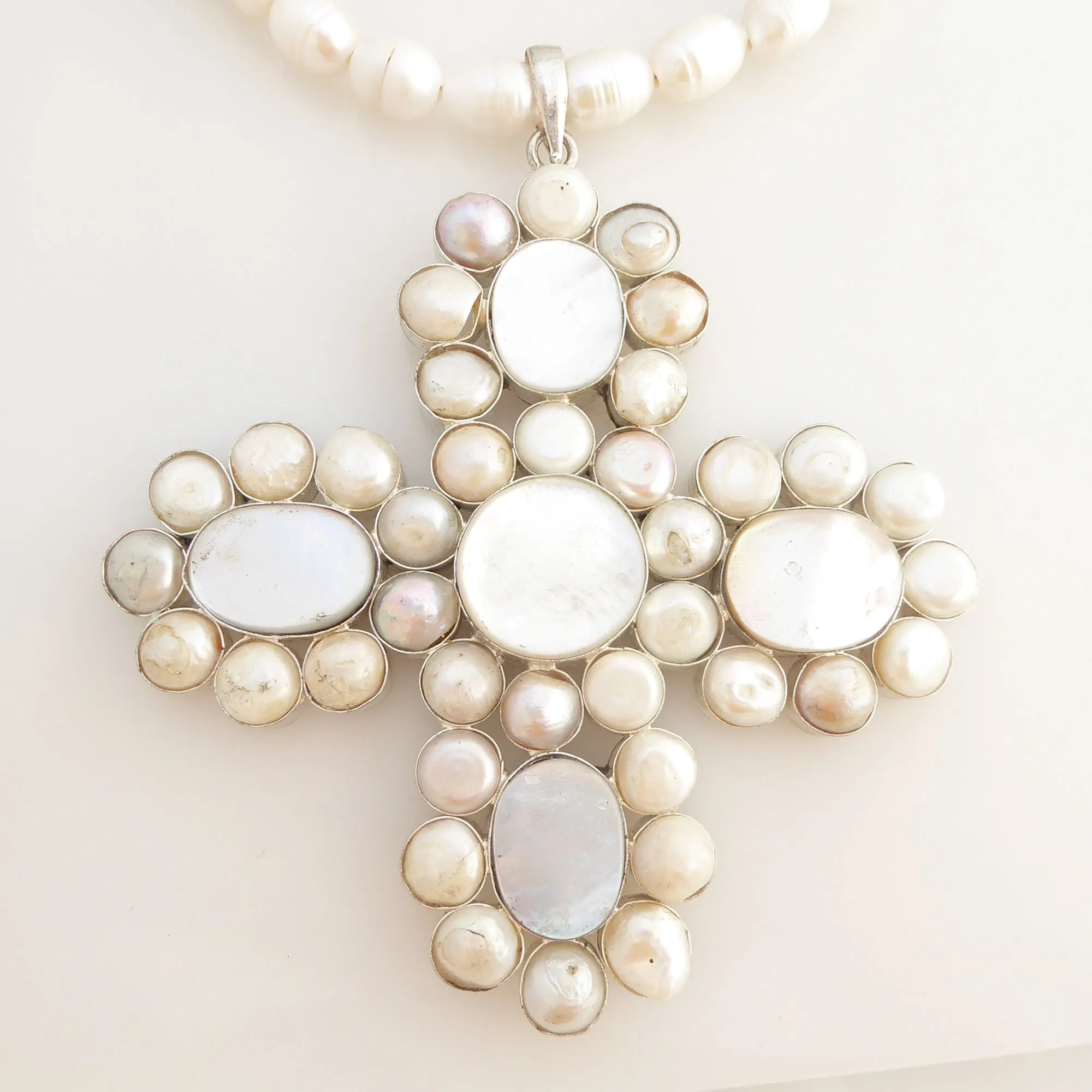 Pearl cross pendant necklace