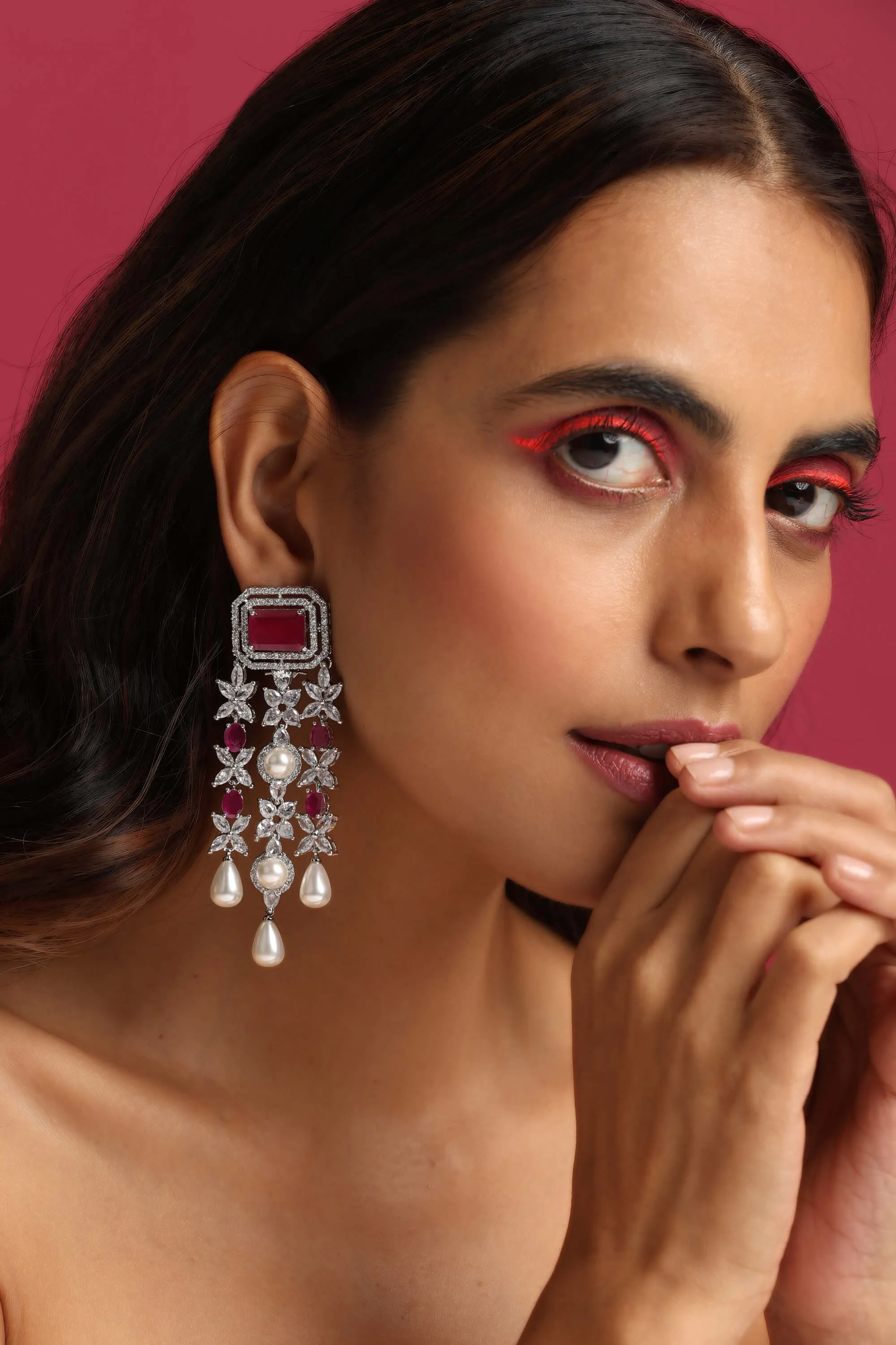Red silver tone dangler earrings