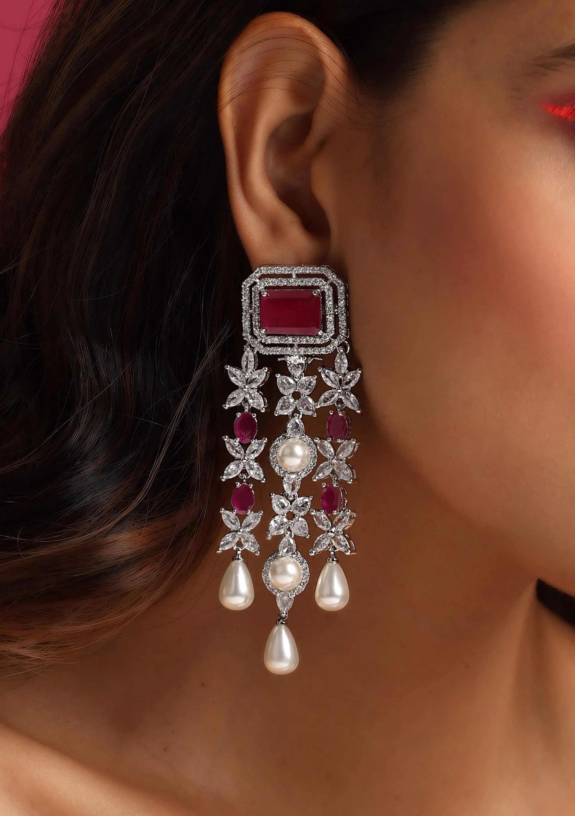 Red silver tone dangler earrings