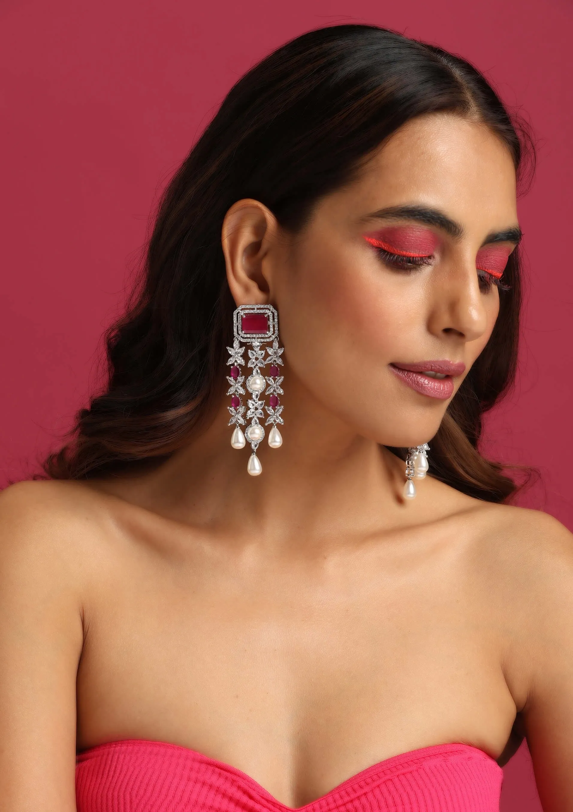 Red silver tone dangler earrings