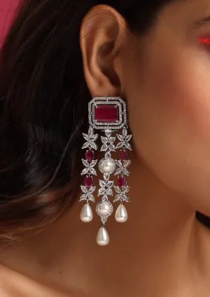 Red silver tone dangler earrings