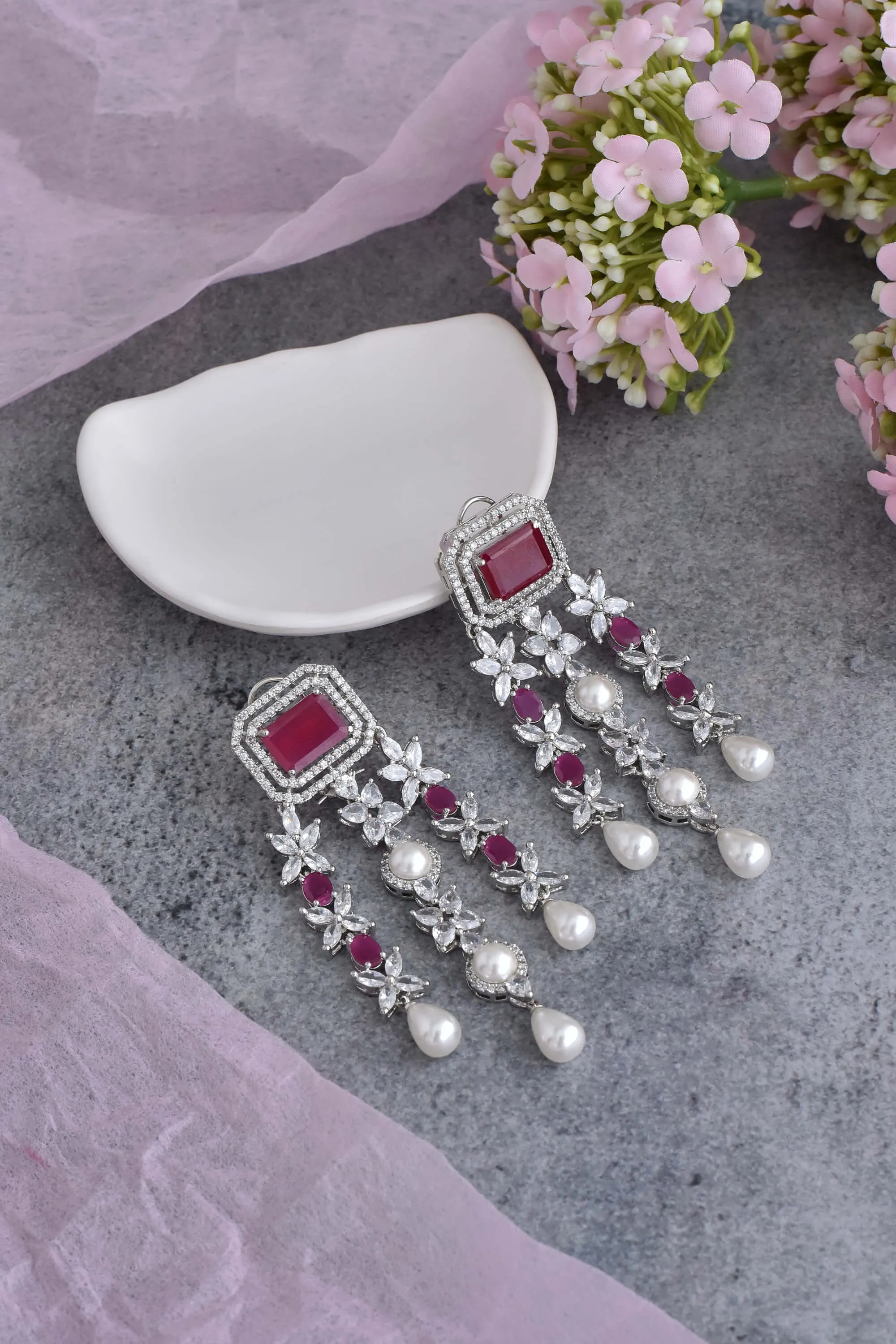 Red silver tone dangler earrings